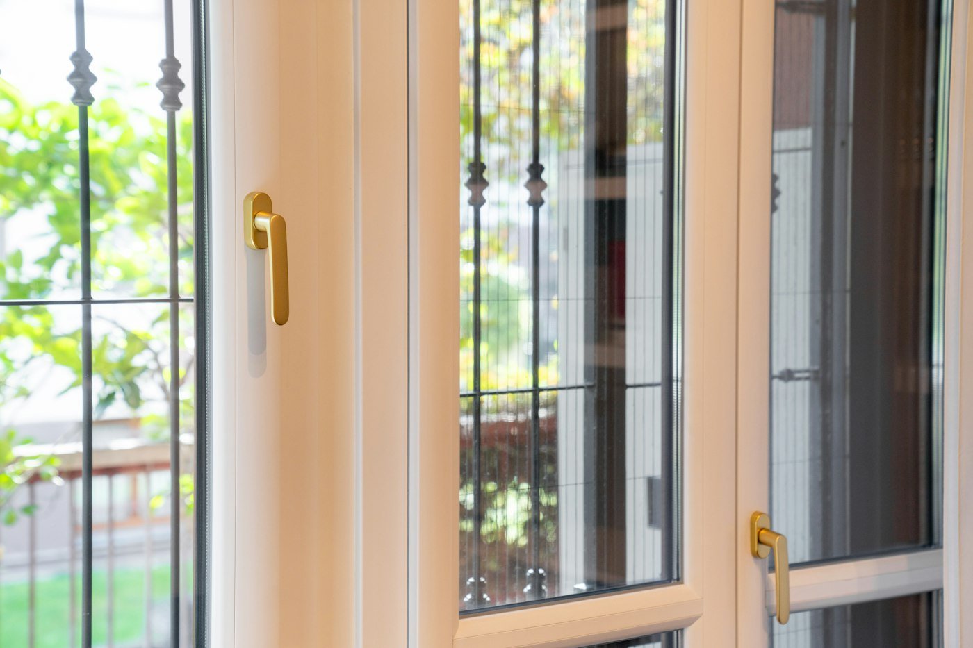 White uPVC window frame with glazing and handle
